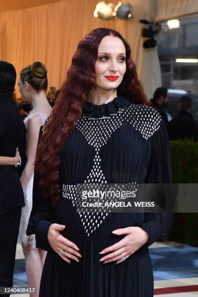 British actress Sophie Turner arrives for the 2022 Met Gala at the Metropolitan Museum of Art on May 2 in New York. - The Gala raises money for the...