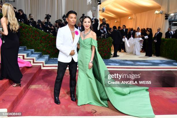 Malaysian actress Michelle Yeoh and US fashion designer Prabal Gurung arrive for the 2022 Met Gala at the Metropolitan Museum of Art on May 2 in New...