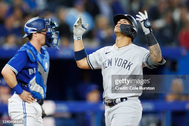 Gleyber Torres of the New York Yankees celebrates a two-run home run at the plate during the fourth inning of their MLB game against the Toronto Blue...