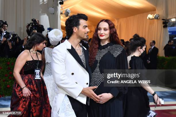 Musician-actor Joe Jonas and wife English actress Sophie Turner arrive for the 2022 Met Gala at the Metropolitan Museum of Art on May 2 in New York....