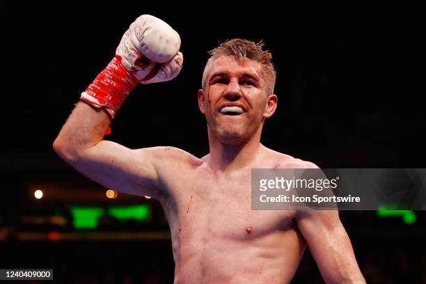 Liam Smith of Liverpool England holds reacts after defeating Jessie Vargas of Las Vegas Nevada for the WBO Intercontinental Middleweight Title on...