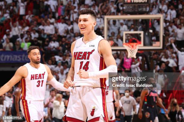 Tyler Herro of the Miami Heat smiles during Game 1 of the 2022 NBA Playoffs Eastern Conference Semifinals on May 2, 2022 at FTX Arena in Miami,...