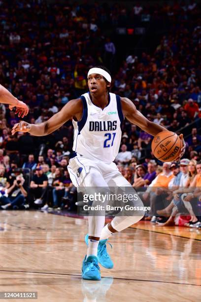 Frank Ntilikina of the Dallas Mavericks dribbles the ball against the Phoenix Suns during Game 1 of the 2022 NBA Playoffs Western Conference...