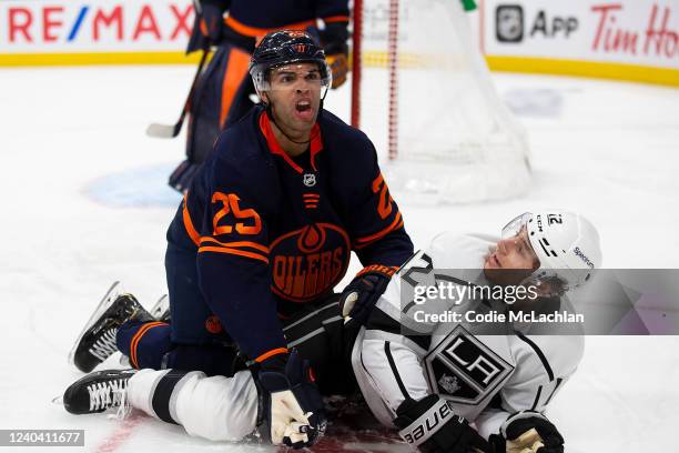 Darnell Nurse of the Edmonton Oilers protests a penalty against Trevor Moore of the Los Angeles Kings during the third period in Game One of the...