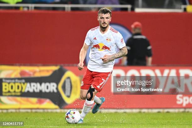 New York Red Bulls defender Tom Edwards dribbles the ball in action during a game between the Chicago Fire and the New York Red Bulls on April 30,...