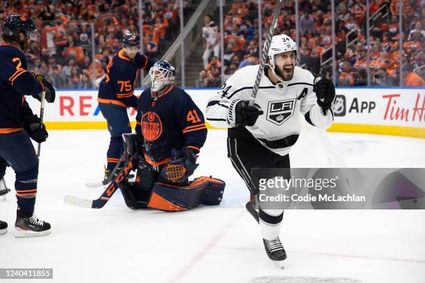Phillip Danault of the Los Angeles Kings celebrates the game-winning-goal against goaltender Mike Smith of the Edmonton Oilers during the third...