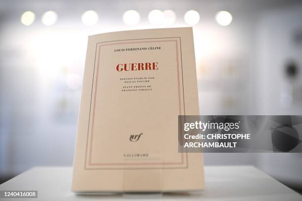 Picture taken on May 3, 2022 shows a copy of French writer Louis-Ferdinand Celine's novel "Guerre" , two days ahead of its release, at the Gallimard...