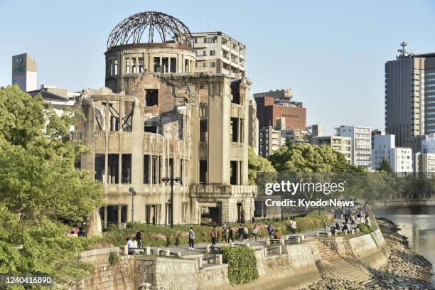 People visit the Atomic Bomb Dome in Hiroshima on May 3, 2022.