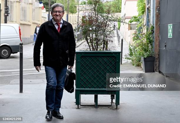 French leftist movement La France Insoumise's leader and three times presidential candidate Jean-Luc Melenchon arrives at LFI's headquarters in Paris...