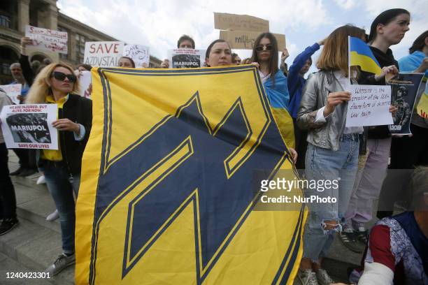 Wives of servicemen of 'Azov' Battalion, relatives and activists take part in a rally 'Save the military of Mariupol', amid Russian invasion in...
