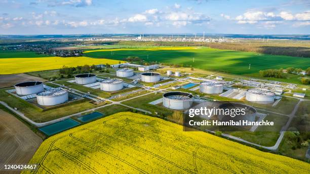 In this aerial view, huge tanks for crude oil of the PCK oil refinery, which is majority owned by Russian energy company Rosneft and processes oil...