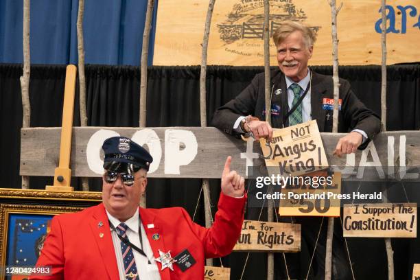 Maine State Representative Jim Thorne, playing the Constable, puts Angus King impersonator, fellow Representative Jeff Hanley in GOP Jail during the...