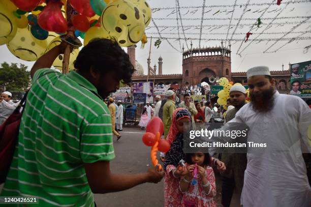 Muslim devotees gather outside to offer Eid Ul-Fitr prayers at the Jama Masjid on May 3, 2022 in New Delhi, India. Muslims around the world are...