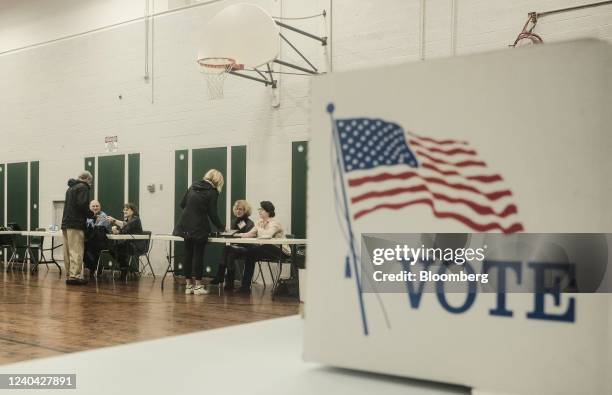 Voters check-in at a polling location in Columbus, Ohio, U.S., on Tuesday, May 3, 2022. The first major test of Donald Trump's hold on Republican...