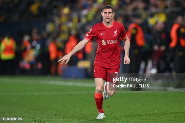 Liverpool's English midfielder James Milner gestures during the UEFA Champions League semi final second leg football match between Liverpool and...