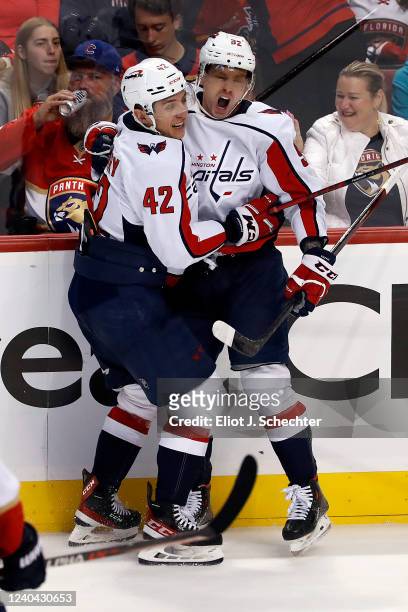 Evgeny Kuznetsov of the Washington Capitals celebrates his goal with teammate Martin Fehervary during the Third period against the Florida Panthers...
