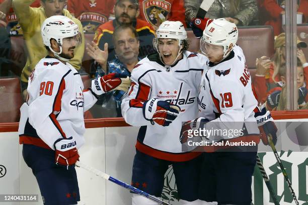 Oshie of the Washington Capitals celebrates his third period goal with Marcus Johansson and Nicklas Backstrom against the Florida Panthers in Game...