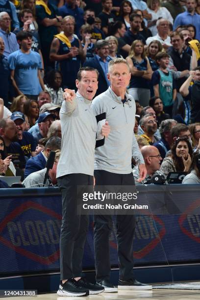 Assistant Coach Kenny Atkinson and Head Coach Steve Kerr of the Golden State Warriors look on during the game against the Memphis Grizzlies during...