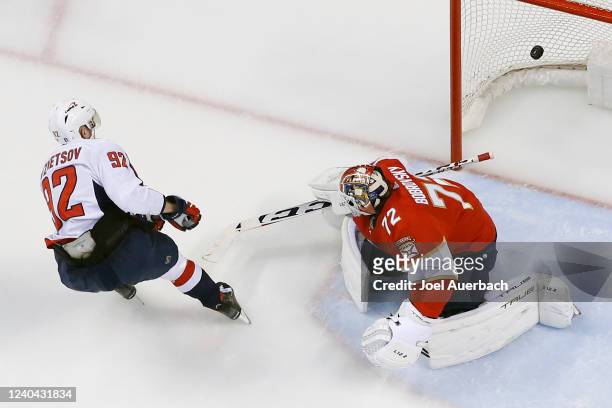 Evgeny Kuznetsov of the Washington Capitals scores a third period goal past Goaltender Sergei Bobrovsky of the Florida Panthers in Game One of the...