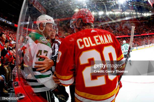 Blake Coleman of the Calgary Flames exchanges pleasantries with Alexander Radulov of the Dallas Stars in Game One of the First Round of the 2022...