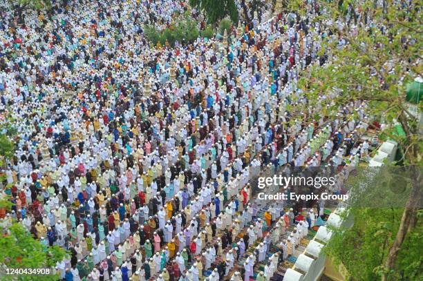 Aerial view of Muslim worshippers gathered to take part in Eid prayers as part of the Holy Eid-al-Fitr in Sylhet, held at the historic Shahi Eidgah...