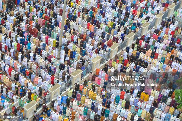 Aerial view of Muslim worshippers gathered to take part in Eid prayers as part of the Holy Eid-al-Fitr in Sylhet, held at the historic Shahi Eidgah...