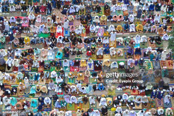 Aerial view of Muslim worshippers gathered to take part in Eid prayers as part of the Holy Eid-al-Fitr in Sylhet, held at the historic Shahi Eidgah...