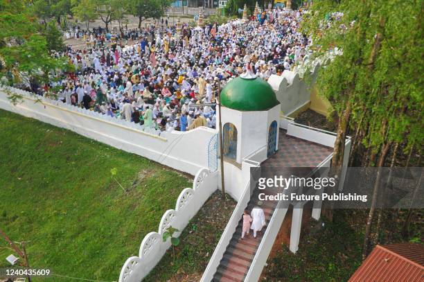 Aerial view of Muslim worshippers gathered to take part in Eid prayers as part of the Holy Eid-al-Fitr in Sylhet, held at the historic Shahi Eidgah...