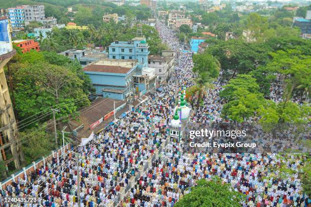 Aerial view of Muslim worshippers gathered to take part in Eid prayers as part of the Holy Eid-al-Fitr in Sylhet, held at the historic Shahi Eidgah...