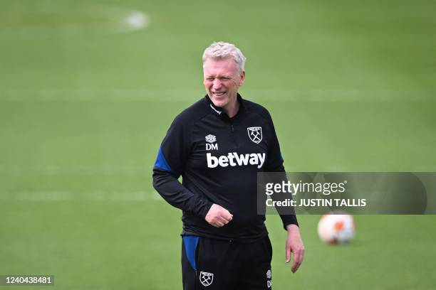 West Ham United's Scottish manager David Moyes reacts as he leads a West Ham United's training session at West Ham United's training ground in east...