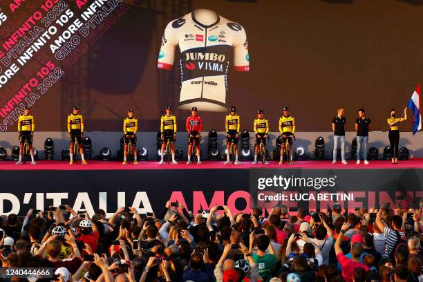 Team Jumbo-Visma poses on stage during the opening ceremony of the presentation of participating teams and riders at the Heroes square in Budapest,...