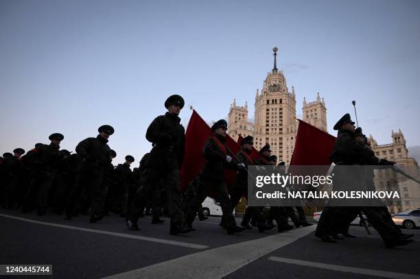 Russian servicemen march as they take part in a rehearsal of the Victory Day military parade, in central Moscow on May 4, 2022. - Russia will...