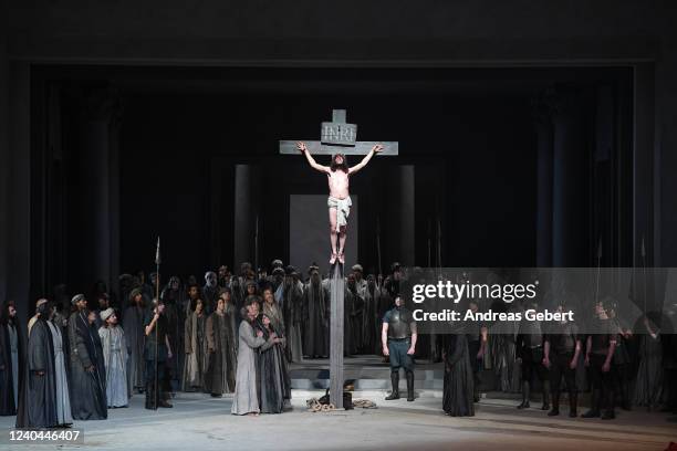 Rochus Rückel as Jesus is crucified during the dress rehearsal for the 42nd Oberammergauer Passionsspiele at Passionstheater on May 4, 2022 in...