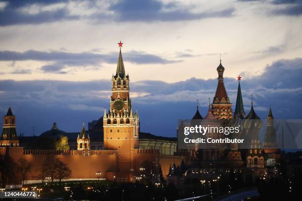 The Kremlin, Spassky Tower and Saint Basile's Cathedral are seen during the Red Square Victory Day Parade rehearsals on May 4, 2022 in Moscow,...