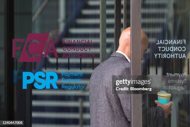 The Financial Conduct Authority logo on a door at their offices in London, U.K., on Wednesday, May 4, 2022. Staff at the watchdog have made it very...