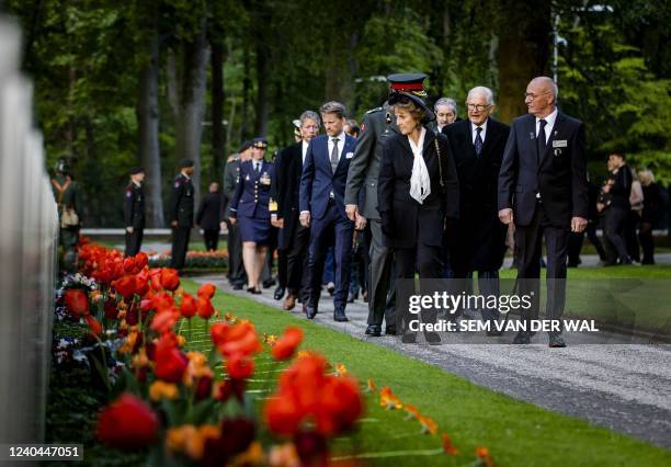 Dutch Princess Margriet of the Netherlands, Prof. Pieter van Vollenhoven and Prince Pieter-Christiaan lay a flower during the National Military...