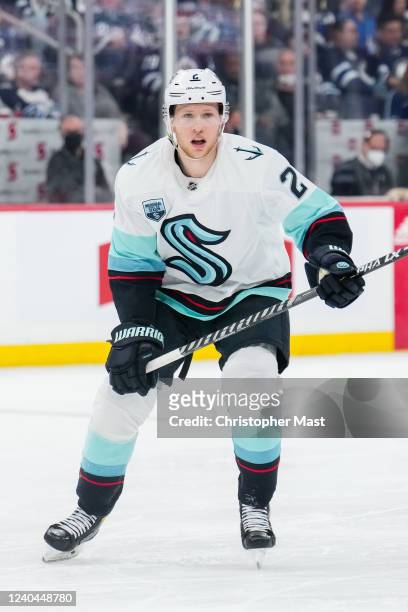 Dennis Cholowski of the Seattle Kraken skates during the second period of a game against the Winnipeg Jets at Canada Life Centre on May 01, 2022 in...