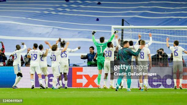 The players of Real Madrid CF celebrate after winning the UEFA Champions League Semi Final Leg Two match between Real Madrid and Manchester City at...