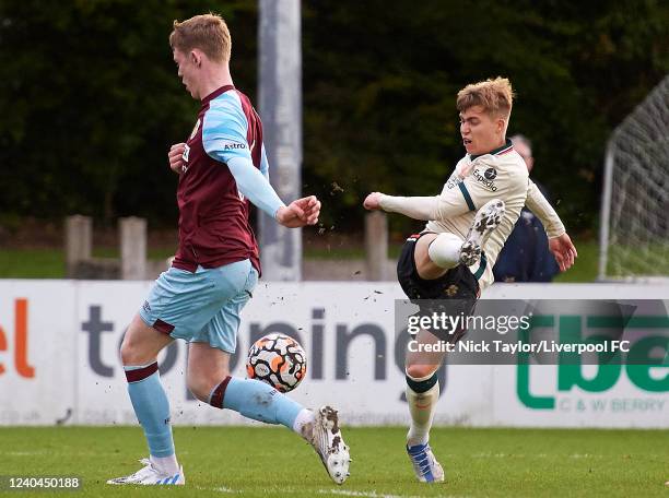 Jack Bearne of Liverpool and Jake Rooney of Burnley in action during the Lancashire Senior Cup final at Lancashire FA County Ground on May 4, 2022 in...