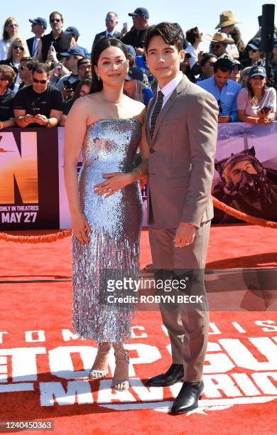 Canadian actors Manny Jacinto and Dianne Doan arrive to the world premiere of "Top Gun: Maverick!" aboard the USS Midway in San Diego, California on...