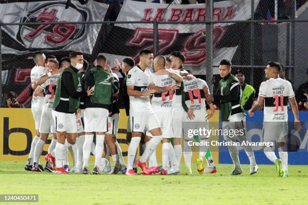 Saul Salcedo celebrate with his teammates the first goal for their team during a match between Olimpia and Peñarol as part of Copa CONMEBOL...