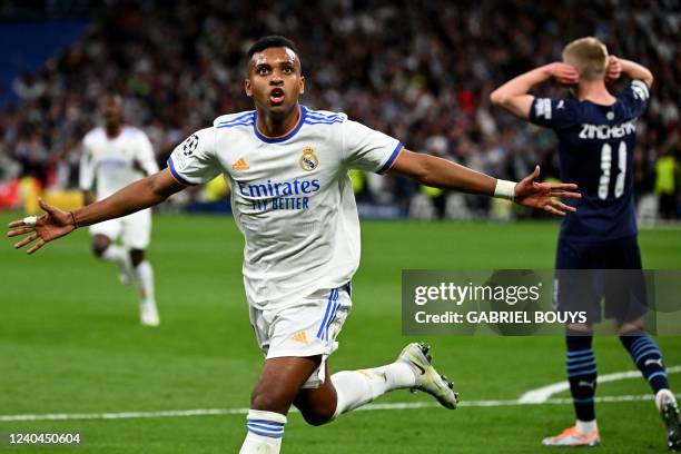 Real Madrid's Brazilian forward Rodrygo celebrates his goal during the UEFA Champions League semi-final second leg football match between Real Madrid...