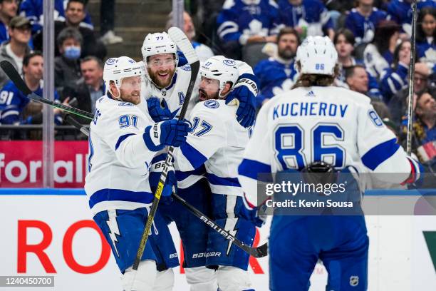 Victor Hedman of the Tampa Bay Lightning celebrates his goal against the Toronto Maple Leafs with teammates Steven Stamkos, Alex Killorn and Nikita...
