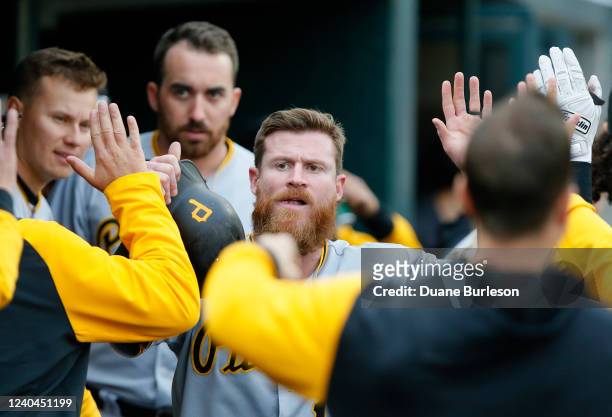 Ben Gamel of the Pittsburgh Pirates celebrates after scoring on a wild pitch during the seventh inning of Game Two of a doubleheader against the...