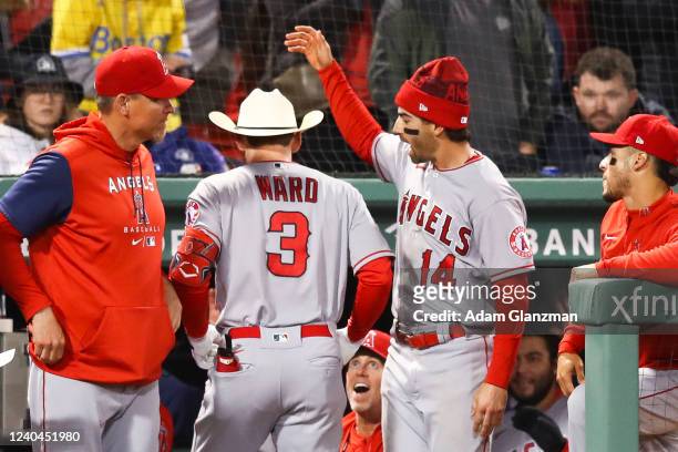Taylor Ward of the Los Angeles Angels returns to the dugout after hitting a two-run home run in the tenth inning of a game against the Boston Red Sox...