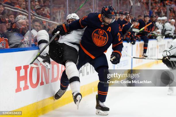 Darnell Nurse of the Edmonton Oilers battles against Alex Iafallo of the Los Angeles Kings during the first period in Game Two of the First Round of...