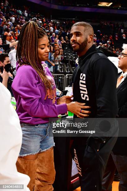 Chris Paul of the Phoenix Suns and his wife Jada Paul embrace after the game during Game 2 of the 2022 NBA Playoffs Western Conference Semifinals on...