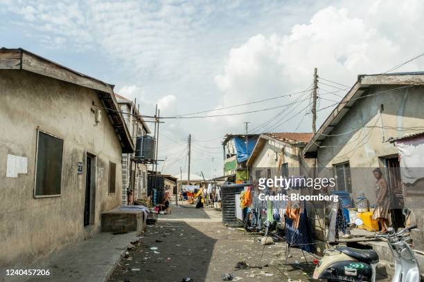 Street lined with Face-Me-I-Face-You housing in Lagos, Nigeria, on April 14, 2022. The Face-Me-I-Face-You homes found in Lagos core right to the...