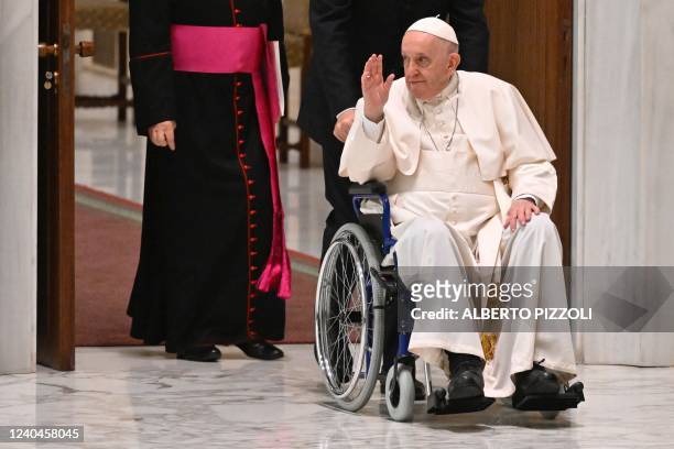 Pope Francis arrives on wheelchair during the audience to the Participants to Plenary Assembly of the International Union of Superiors General on May...