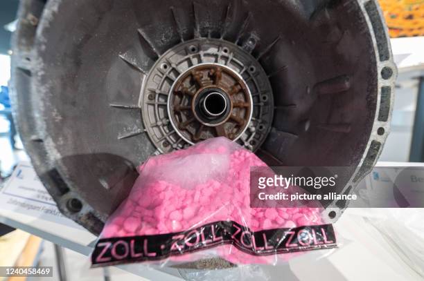 May 2022, Hessen, Frankfurt/Main: MDMA lies a motor gear used for smuggling during the annual press conference of the Frankfurt Main Customs Office...
